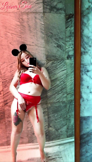 Young Girl Her in Front of the Mirror