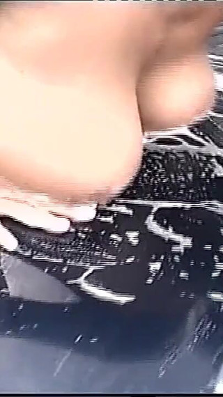 Amazing Blonde with Huge Tits Touches Her Tight Pussy While Washing the Car