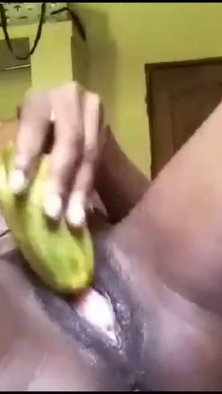 Black Slut Masturbates with Cucumber and Squirts