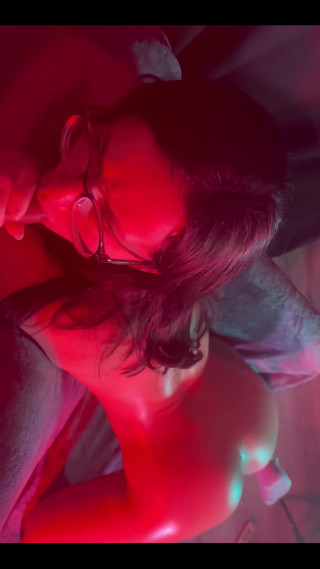 Sucking Dick While I Have a Toy Inside Me with Red and Blue Lighting