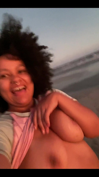 Sunset the Beach and Me with No Bra Showing off My Boobies
