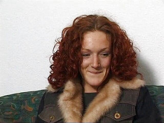 Cute redhead fingering her love hole