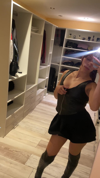 Latex Whore Shows You Her Tits