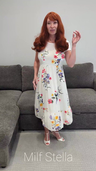 A Redhead in a Dress