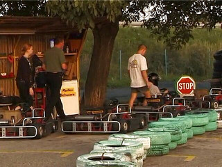Sexy blonde chick has a nice time outdoors at the karting path