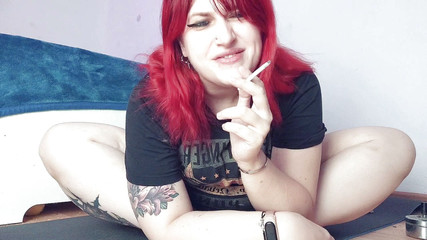 I love playing my pussy as I relax with a cig