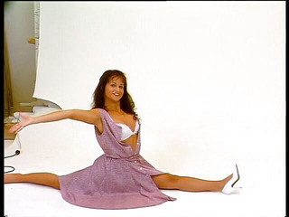 Stunning brunette babe at the photo shooting