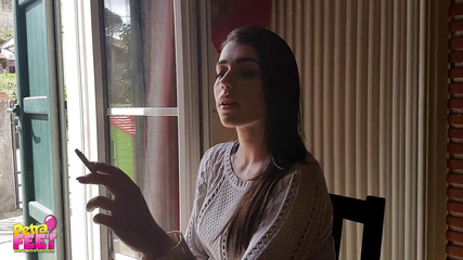 Gorgeous brunette teasing everyone with her smoking