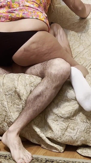 She blowjob the boy dick on the sofa and then put her big ass on top of him