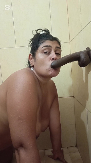 Mature Indian Woman Masturbates with a Huge Black Dildo Until She Reaches Multiple Squirts