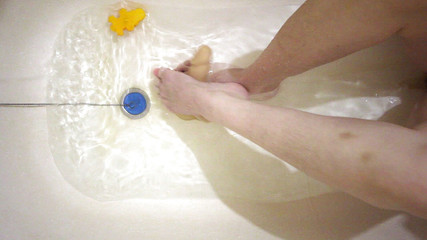 Sexy legs in the bath, footjob and handjob