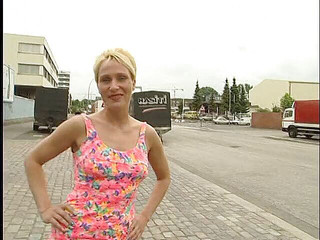 Short hair blonde babe is showing her nice tits outdoors