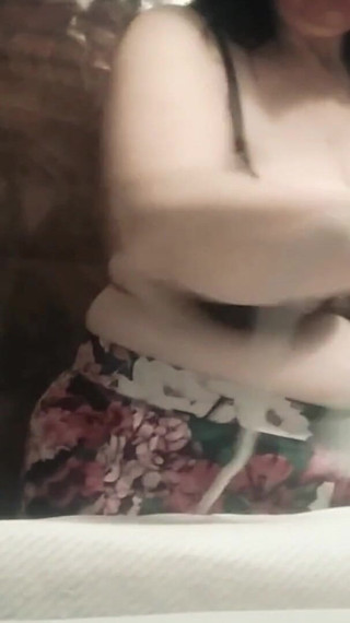 Stepmom, 57 Years Old, with Big Natural Tits, Irons Clothes and Has a Secret Video Call with Her Stepson.