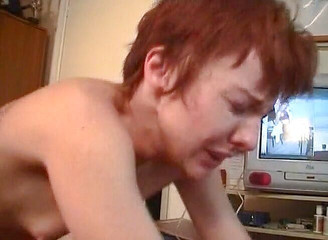 Redhead MILF slut takes cock in her shaved ass