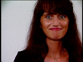 Brunette wearing lingerie blowing cock and getting cum in mouth