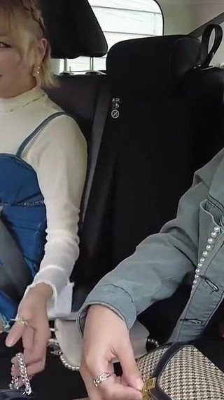 A Blonde and a Dark-haired Beauty Share Wild Passion Beneath the Open Sky. - a