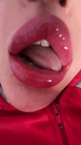 Captivated by the of Big Lips and Glossy Kisses