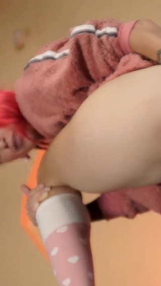 Petite Tattoed Redhead Plays with Buttplug in Her Tight Ass