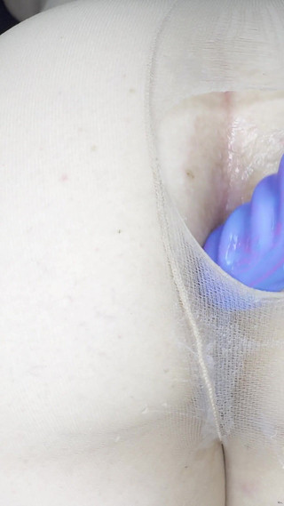 Ribbe Dildo Through Ripped Pantyhose