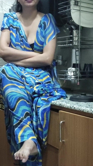 Indian Stepmom Watches and Enters Her Stepson's Kitchen to Fuck Him.