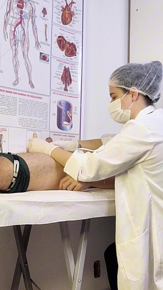 Patient Becomes Rigid in Front of the Nurse During the Examination