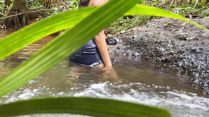 Girl Is Filmed in the River and You Can See the Transparency