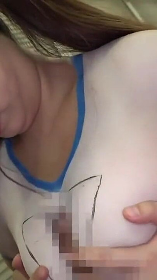 A Curvy Beauty in Color Strolls Boldly Through the City in Playful Tease. - C