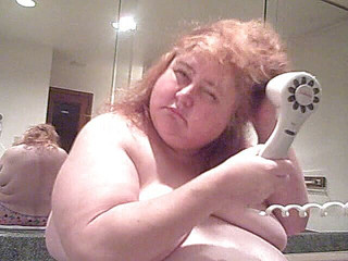 MILF BBW redhead blows dry hair nude