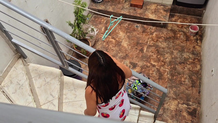 The Neighbor Is Watched Washing Clothes by Her Neighbor