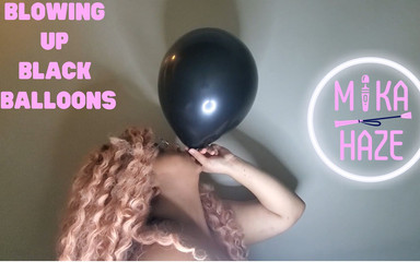 Blowing up black balloons