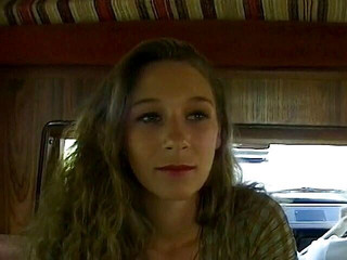 Nice looking blonde shoving her body in a van