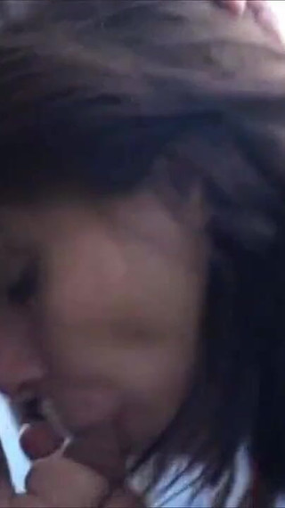 Horny brunette gets fucked outdoors by two guys