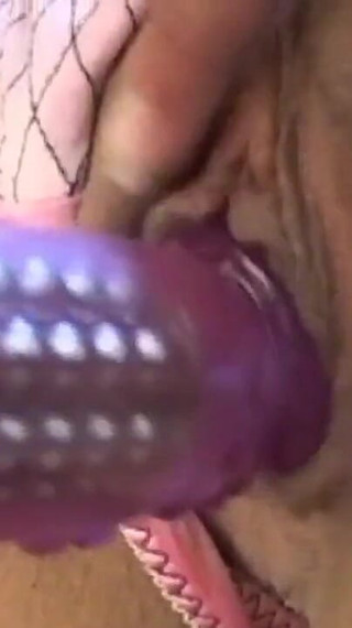 Horny brunette masturbates at home with her Sex Toy